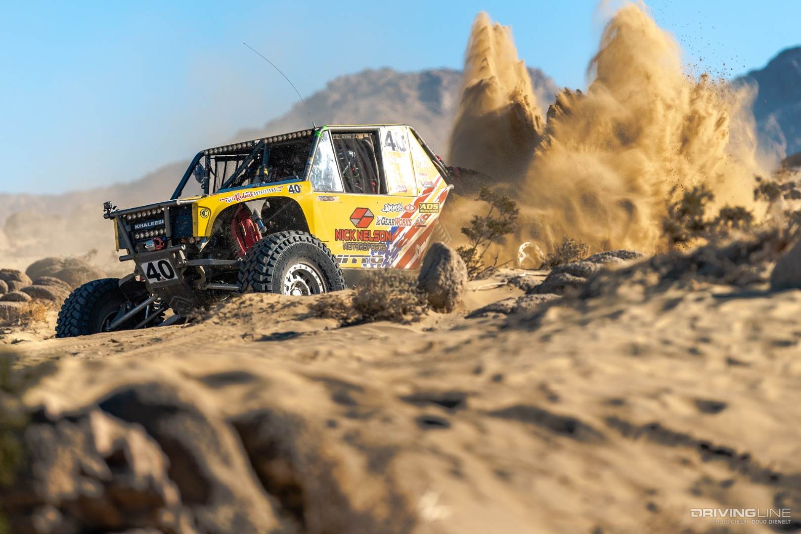 Nick Nelson's rig kicking up dirt in the desert