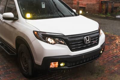 Honda Ridgeline with LED lighting on in the rain